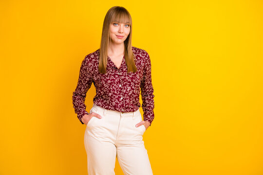 Photo portrait of confident business woman wearing floral blouse smiling isolated bright yellow color background