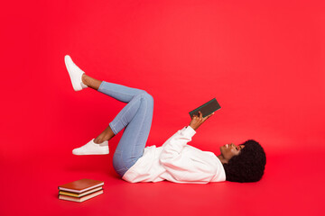 Full size profile photo of nice wavy hairdo student lady lie read book wear white sportswear jeans...