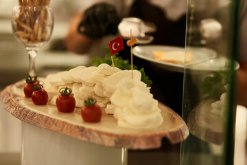 Turkish colorful cheese for picking up from buffet for hotel system of all-inclusive with turkish flag. Copy space