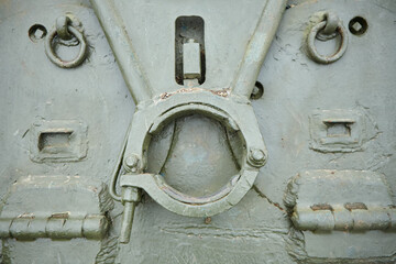 An old vintage mechanism of the unit or device. Technologies of the past, covered with old paint or rust.