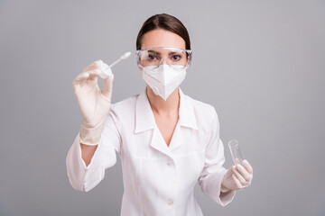 Photo of serious confident young lady doctor workwear glasses mask making you pcr corona test isolated grey color background - obrazy, fototapety, plakaty