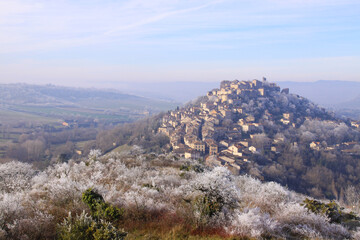 Retro townscape and countryside towering over the mountains