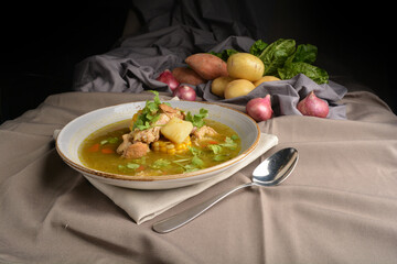 chicken with corn and potato hot soup Peruvian cuisine menu