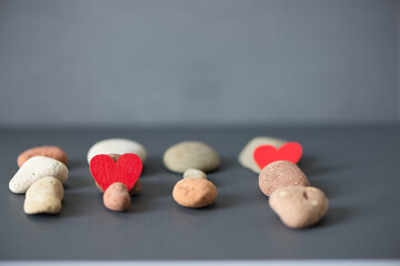hearts and stones on paper