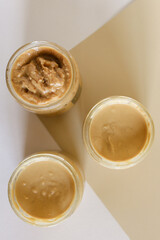 Peanut or Almond Butter in jar Selective focus