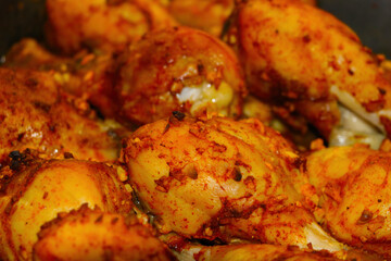 Beautiful appetizing fried chicken in the oven, homemade food.