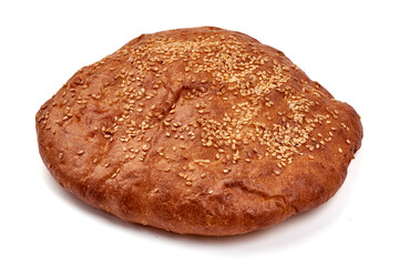 Traditional round rye bread, isolated on white background.
