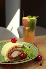 Tasty meringue roll in cafe