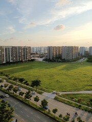 The aerial view of  the north east part of Singapore, large green meadow and lots of residential buildings