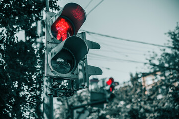 Red traffic light in the city street