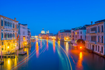 Beautiful Long Exposure over Grand Canal with Light Trails in Venice, Italy.