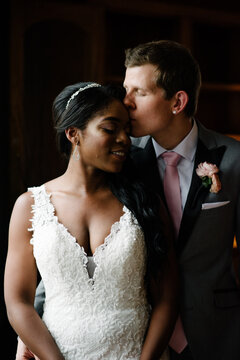 Bi Racial Couple Married With A Dark Background