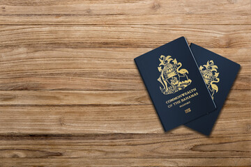 Bahamas passport on a wooden board 