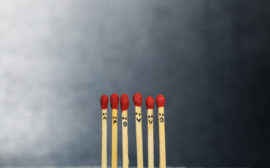 Group of a red match burning isolated with the background. Row burning matchstick in the chain...