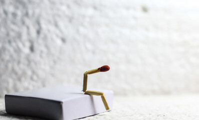 Concept of weakness, sadness, and loneliness. Image of a man-made matchstick. Matchstick man...