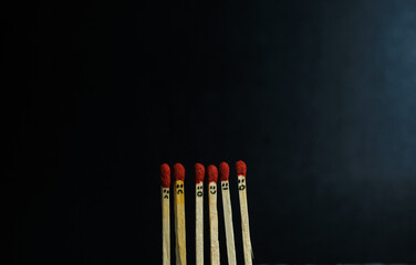 Group of a red match burning isolated with the background. Row burning matchstick in the chain reaction. Matchstick art photography.