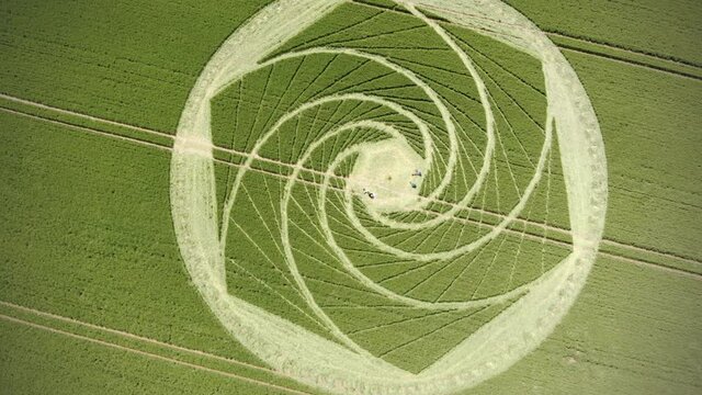 Aerial drone view of crop circle formation in corn field, Avebury, Wiltshire, UK