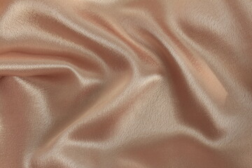 Fototapeta premium Draped beige satin background