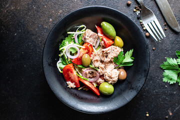 tuna salad vegetables tomato, onion, herbs, olives other canned tuna fish seafood on the table, healthy meal copy space food background top view keto or paleo diet veggie vegetarian food pescetarian 