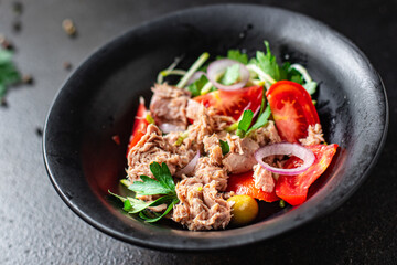 tuna salad vegetables tomato, onion, herbs, olives other canned tuna fish seafood on the table, healthy meal copy space food background top view keto or paleo diet veggie vegetarian food pescetarian 