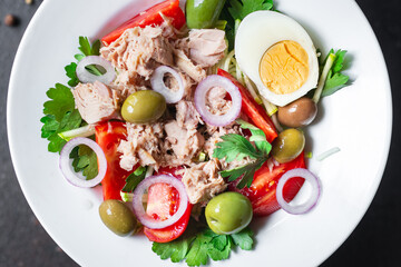 tuna salad vegetables tomato, onion, herbs, olives other canned tuna fish seafood on the table, healthy meal copy space food background top view keto or paleo diet veggie vegetarian food pescetarian 