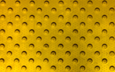 Yellow background dots on the street