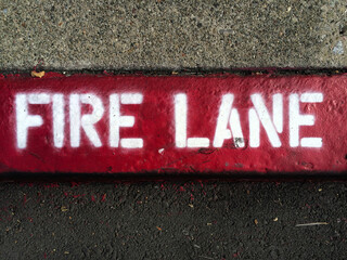 Fire lane sign on the pavement