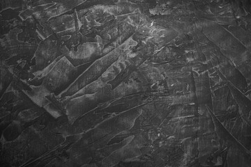 texture of dark concrete or plaster. Scratched concrete background.