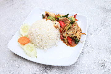 Fried Pork with Chili with Rice  put on dish with Chili Fish Sauce asian food in restaurant, favorite food in Thailand,