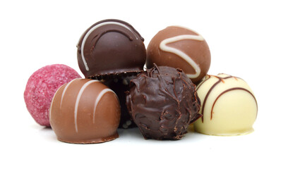 Chocolate candies collection. Beautiful Belgian truffles isolated on white background