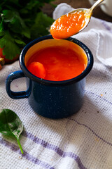 Carrot soup on a table in mugs. Homemade healty food
