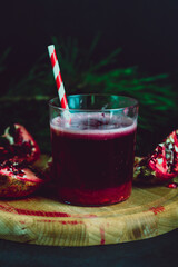 Fall and winter sangria with pomegranate. Christmas Eve Table Decoration.Retro Tropic Instagram Style Effect