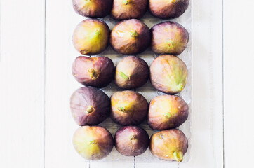 Figs in a tray, selective focus