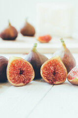 Retro Figs on white wooden boards, selective focus