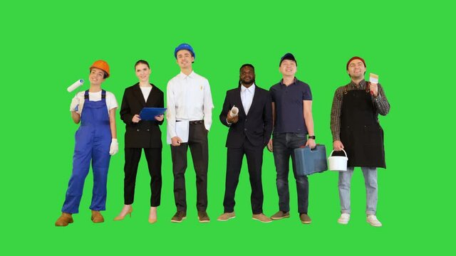 Business, delivery service and people concept - happy international office and manual workers on a Green Screen, Chroma Key.