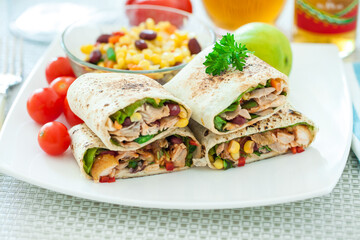 Traditional Mexican Food -  Burrito, on white wooden retro table