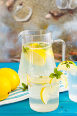 Bottle of fresh drink with lemon and mint flavour, juice