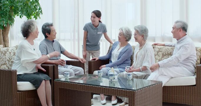 Happy senior friends talking in nursing home,4K