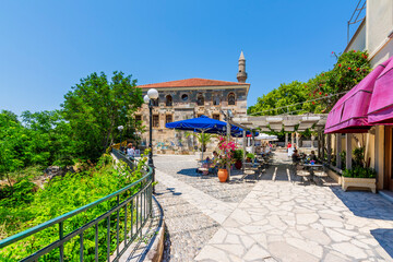 Hippocrates square and Gazi Hasan Pasha Mosque view in Kos Town. Kos Island is popular tourist destination in Aegean Sea.