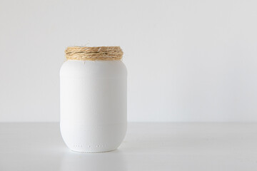 White jars on white background minimalism concept