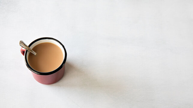 milk coffee on a rustig mug on white background