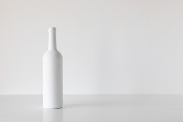 white bottle on white background minimalism concept