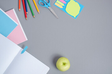 Back to school, stationery on gray background with copy space