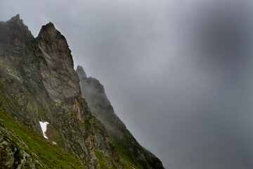 Fototapeta na wymiar alpin landscape with fog (Vorarlberg, Austria)