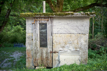 old wooden door of small house with chimney 