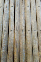 Wood texture with some nails. Planks of light and rustic wood. Top view.