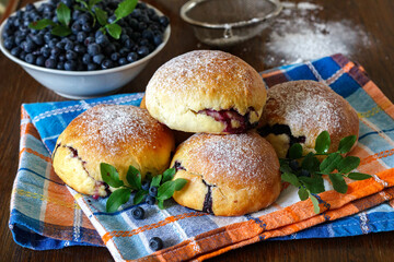 Homemade buns stuffed with blueberries