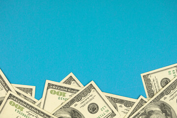 Dollar on the table, bottom border composition with copy space, top view photo