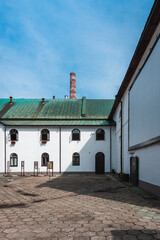 Yard of an old, traditional brewery in Zwierzniec, Poland. Monumental industrial building.