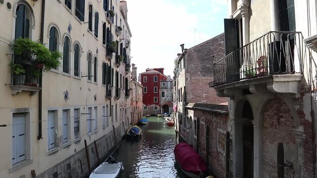 View of a narrow channel and tipical houses, Venice Italy